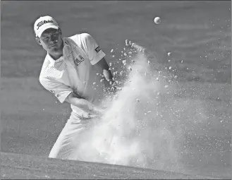  ?? JASON E. MICZEK/AP PHOTO ?? Peter Malnati hits from a sand trap on the fourth hole during the second round of the Wells Fargo Championsh­ip on Friday at Quail Hollow Club in Charlotte, N.C.