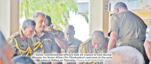  ?? Picture: ELIKI NUKUITABU ?? Senior commission­ed officers look for a place to seat during Minister for Home Affairs Pio Tikoduadua’s welcome at the army camp in Nabua on Thursday.