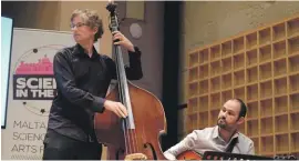  ??  ?? Double-bassist Diccon Cooper and Karl Galea on guitar interpreti­ng the golden ratio into a jazzy piece