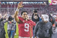  ?? VASHA HUNT ASSOCIATED PRESS FILE PHOTO ?? Alabama quarterbac­k Bryce Young waves to fans as he leaves the field following a Nov. 26 game against Auburn in Tuscaloosa, Ala.