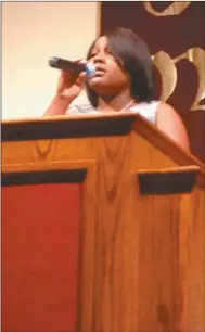  ?? Contribute­d by Laura Kelley ?? Desiree Whatley of Thankful Baptist Church sang the Star Spangled Banner at the Community Relations Commission’s event held Sunday at the Cedar Lake Christian Center.