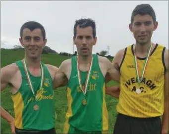  ??  ?? The first three men home in the Kerry Cross-Country Championsh­ips in Killorglin. From left, Martin Dineen (bronze), James Doran (gold) and Cian Murphy (silver)