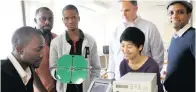  ?? PICTURE: BONGANI MBATHA/AFRICAN NEWS AGENCY (ANA) ?? Working on getting the equipment tested are, standing from left, Bismark Kushiator, Kabelo Kesebonye and professors Jonathan Sievers and Kavilan Moodley. Seated from left are Austin Gumba and Professor Cynthia Chiang.