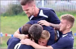  ?? ?? Derby victory: Wombwell Town celebrate their win at Dodworth MW.