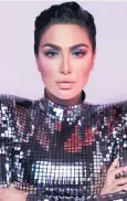  ??  ?? Cool look: Huda Kattan wears eye make-up created using the Mercury Retrograde Palette, £58, available from Cult Beauty (below)
4. Don’t be afraid to experiment