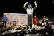  ?? JEFF ROBERSON - THE ASSOCIATED PRESS ?? Josef Newgarden celebrates after winning an IndyCar auto race at World Wide Technology Raceway on Saturday, Aug. 21, 2021, in Madison, Ill.