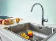  ?? ?? Ideal for a novice, this tap is quick to install without tools. BauFlow single-lever sink mixer,
This versatile splashback is waterproof and fire resistant, so suitable for installing behind the sink and hob. White Crackle Tile alloy splashback, from