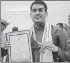  ??  ?? ▪ Sachin Singh and (right) Chaitanya Rathore with a family member at the convocatio­n ceremony.