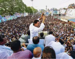  ?? — PTI ?? YSR Congress president Y. S. Jaganmohan Reddy waves to his supporters during his Praja Sankalpa Yatra in Pedana on Saturday.