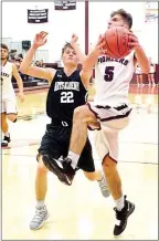  ?? Westside Eagle Observer/RANDY MOLL ?? Gentry’s Blake Wilkinson, a junior guard, shoots for two over an Arkansas Arts Academy defender during play at Gentry High School on Thursday, Nov. 29.