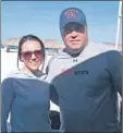  ??  ?? Green Bay Packers coach Mike McCarthy poses with Abigail Kobriger on Marco Island.