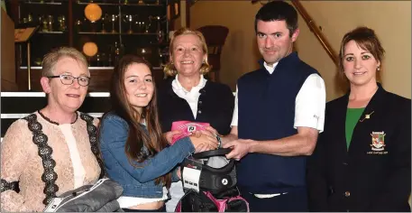  ??  ?? Donal Considine presenting first prize in the Golf Shop College Street Ladies competitio­n to winner Corinna Griffin with Peggy O’Donoghue 2nd, Miriam McFarlane 3rd and Amy Arthur Lady Captain at Killarney Golf Club, Killarney.