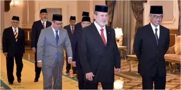  ?? — Bernama photo ?? Sultan Ibrahim (second right) with Tengku Abdullah (right) arrive at the 249th meeting of the Conference of Rulers at Istana Negara. Also seen (from left) are Taib , Yang Dipertua Negeri Sabah Tun Juhar Mahirudin and Dr Tengku Muhammad Fa-iz Petra.