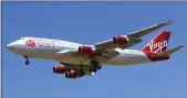  ?? MATT HARTMAN — THE ASSOCIATED PRESS ?? Richard Branson’s Virgin Orbit is slashing 85% of its workforce on Friday, after running into problems with funding less than four months after a mission of the satellite launching company failed.