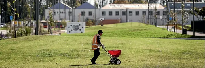  ??  ?? Maintainin­g the 9000sqm of grass in the east frame’s Rauora Park is a long day’s work.