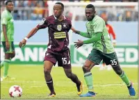  ?? Picture: MICHAEL SHEEHAN ?? THRILLING ENCOUNTER: Nkosomzi Mbenyana, of EC Bees FC, and Orlando Pirates’ Dove Wome battle for the ball during their Nedbank Cup last-32 match at the Sisa Dukashe Stadium in Mdantsane yesterday