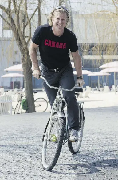 ?? Laura Pedersen / National
Post ?? Curt Harnett, Canadian Olympian and Canada’s chef de mission for the 2015 Pan American
Games in Toronto, says city residents have already recognized him as “the Pan Am Guy.”