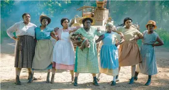  ?? WARNER BROS. PICTURES ?? Danielle Brooks, center, stars as Sofia in “The Color Purple,” which is based on the 2005 Broadway hit.