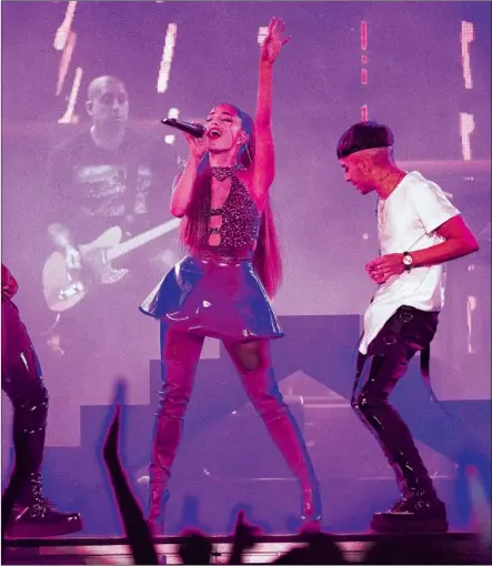  ?? Gina Ferazzi Los Angeles Times ?? PHONE IN her set? Not Ariana Grande, who gave a strong performanc­e Saturday evening at KIIS-FM’s Wango Tango concert.