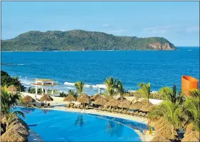  ?? — RICHARD KOHLER ?? Overlookin­g a pool at the Iberostar Playa Mita, where one can watch a magnificen­t sunset behind the mountains.