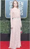  ??  ?? Emma Stone dazzles in a nude, sparkle-adorned gown. A special shout-out to her fresh, rosy glow, the work of makeup pro Rachel Goodwin.