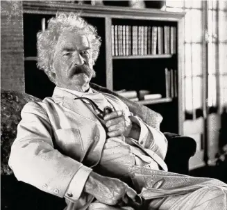  ?? ?? Legendary author Mark Twain is shown here at his home in Redding in 1908. Twain wrote many classics during his lifetime, including “Huckleberr­y Finn.”