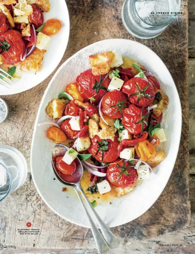  ??  ?? BLISTERED TOMATO, GRILLED CAPSICUM AND PITA SALAD