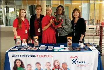  ?? LOANED PHOTO ?? CASA VOLUNTEERS KIMBERLEY K. AND DIANE H., CASA of Yuma County Coordinato­r Jennifer Sterenberg, and volunteers Delores P. and Rosalia D. stand at an informatio­n table during an event at Arizona Western College. The organizati­on provides court advocates for local children in the state foster care system.
