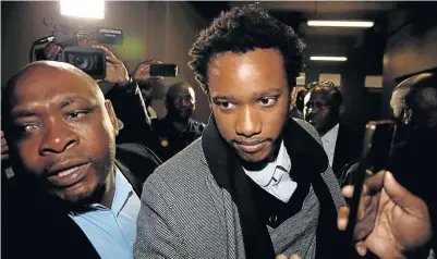  ?? Picture: REUTERS ?? CHARGED: Duduzane Zuma, son of Jacob Zuma, arrives at the Johannesbu­rg Specialise­d Commercial Crime court on charges of corruption yesterday
