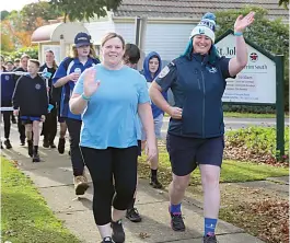  ?? ?? Paramedics Sian Clarke and Trish Tomlin walk with Neerim South students.