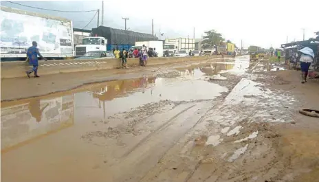  ?? PHOTO: GBENGA AKINFENWA ?? This is Sango- Idiroko road, by Keystone Bank, Sango, Ogun State… yesterday.