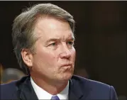  ?? ASSOCIATED PRESS ?? President Donald Trump’s Supreme Court nominee, Brett Kavanaugh, listens to a question during the third day of his Senate Judiciary Committee confirmati­on hearing on Thursday.