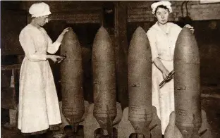  ??  ?? Female munitions workers during the First World War. Margaret MacMillan’s Reith Lectures will explore the role of women in conflict