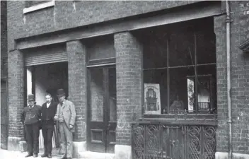  ??  ?? Treadgolds Warehouse, Bishop Street, Portsea in 1905. The man on the left is believed to be Mr Treadgold. The other two are unknown. Picture: Courtesy of Richard Sexton