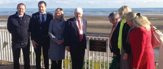  ??  ?? Clllrs Stephen McKee, Paddy Meade, Sharon Tolan, Sharon Keogan and Eimear Ferguson with Minister Kevin Moran and Cathaoirle­ach Tom Kelly at the plaque to unveil the new coastal defences in Laytown