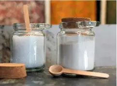  ??  ?? Jars of fixative alum, left, and thickener carrageena­n, with measuring spoons. Both powders are dissolved in water before use.