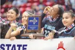  ?? JON AUSTRIA / JOURNAL ?? Navajo Prep players celebrate their victory over Tohatchi to claim the Class 3A girls championsh­ip on Friday at the Pit. The Navajo Prep boys won a blue trophy as well.