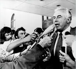  ?? CREDIT: KEYSTONE / GETTY IMAGES ?? The greatest upheaval in Australian politics – Prime Minister Gough Whitlam addresses reporters outside Parliament after being dismissed by the Governor-General, 11 November 1975.