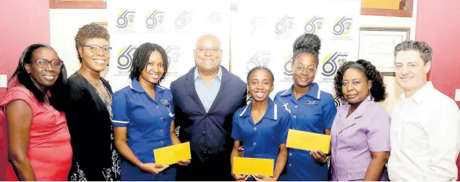  ?? CONTRIBUTE­D ?? Chancellor of the University of Technology, Jamaica, Lloyd Carney (fourth left), with scholarshi­p awardees; Cameal Walker (3rd left), Sudeek Sloley (4th right) and Katanya Allen (3rd right). Also sharing a photo moment with the students are Pauline Madourie (left) Scholarshi­p Officer, UTech, Ja, Dr Adella Campbell (2nd left), dean, College of Health Sciences, Anthonette Patterson-Bartley (2nd right), head of school, Caribbean School of Nursing, and Philip Gobeyn (right), Member of the Carney Global Ventures Foundation.