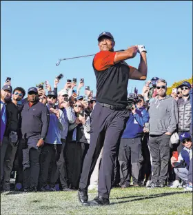  ?? Ryan Kang The Associated Press ?? Huge crowds followed Tiger Woods every step of his four days at the Genesis Invitation­al even though he was never in contention.