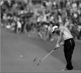  ?? ASSOCIATED PRESS ?? ADAM HADWIN, OF CANADA, hits on the first hole during the third round at the Masters golf tournament Saturday, April 7, 2018, in Augusta, Ga.