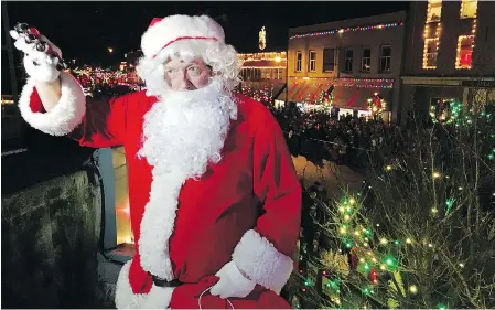  ??  ?? Santa Claus greets the crowd during the 30th annual Ladysmith Light-up celebratio­n on Thursday night.