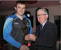  ??  ?? Right: Duhallow Board chairman Joe Kearns presenting the Player of the Year award to Mike Linehan. PhotoS Sheila Fitzgerald