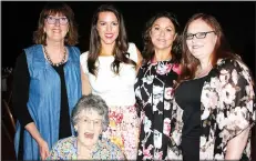  ?? NWA Democrat-Gazette/CARIN SCHOPPMEYE­R ?? Kimberley Lane, Saving Grace alumna (from right), stands with Priscilla Backus, Courtney Backus Norton, Sharon Braswell and Corrine Hunter (seated) at the Butterflie­s and Blooms benefit April 20 at the John Q. Hammons Center in Rogers.