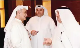  ??  ?? (From left) Editors-in-Chief of Al-Qabas Waleed Al-Nisf, Kuwait Times Abd Al-Rahman Al-Alyan, and Annahar Emad BuKhamseen share a discussion on the sidelines of the event.