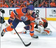  ?? PERRY NELSON / USA TODAY ?? Edmonton Oilers forward Leon Draisaitl maintains his balance after beating Anaheim Ducks goaltender John Gibson in the first period of Sunday’s Game 6 of the NHL’s Western Conference semifinal at Rogers Place in Edmonton, Canada. Draisaitl had five...