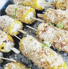  ??  ?? Grilled Mexican street corn can be enjoyed year round.