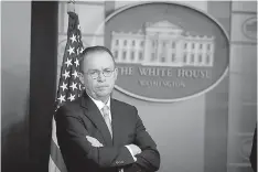  ?? AP Photo/Alex Brandon, File ?? ■ Director of the Office of Management and Budget Mick Mulvaney stands during a press briefing Jan. 20 at the White House in Washington. Mulvaney, appointed acting director of the Consumer Financial Protection Bureau in November, promised to shrink the...