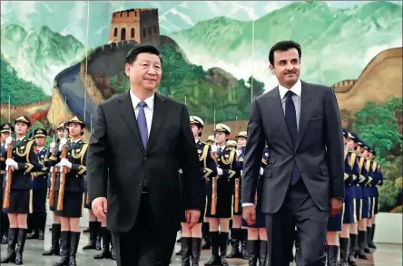  ?? FENG YONGBIN / CHINA DAILY ?? President Xi Jinping greets Qatari Emir Sheikh Tamim bin Hamad al-Thani at the Great Hall of the People in Beijing on Thursday.