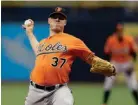  ?? Associated Press ?? Baltimore Orioles starting pitcher Dylan Bundy (37) delivers to the Tampa Bay Rays during the first inning of a baseball game Saturday in St. Petersburg, Fla.